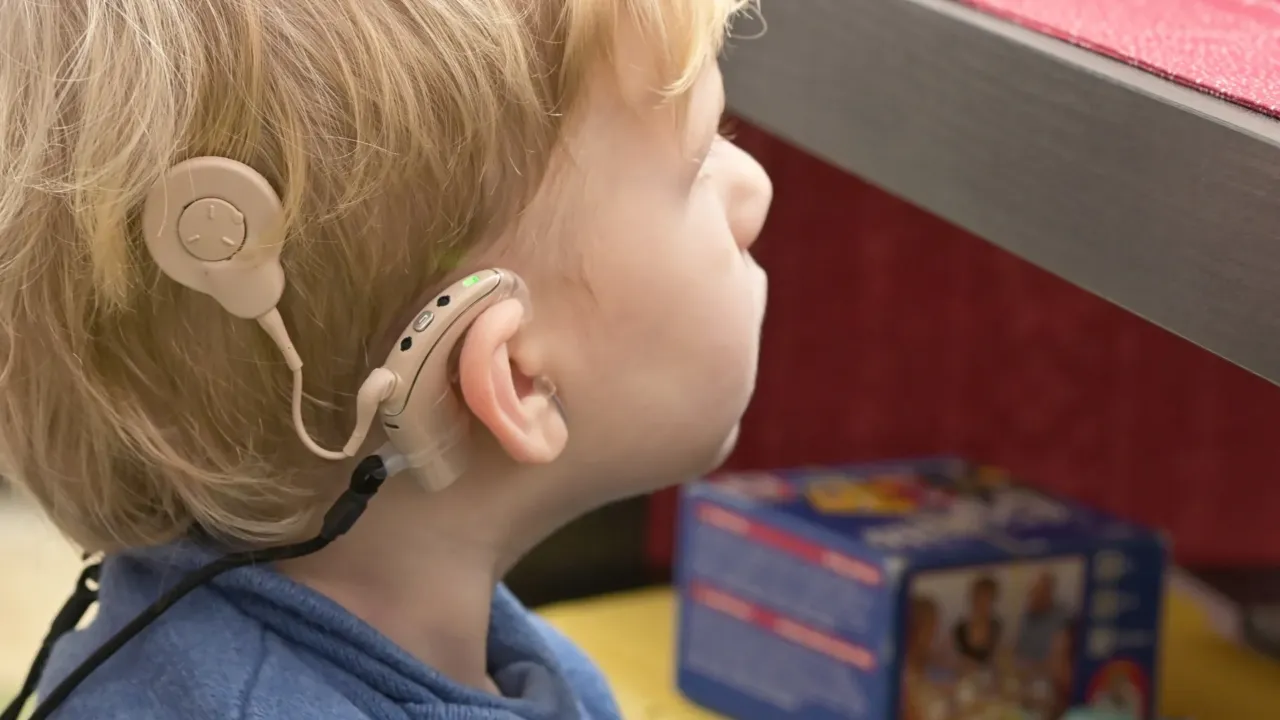 Learn how cochlear implants help children with hearing loss and what parents can expect during the process.